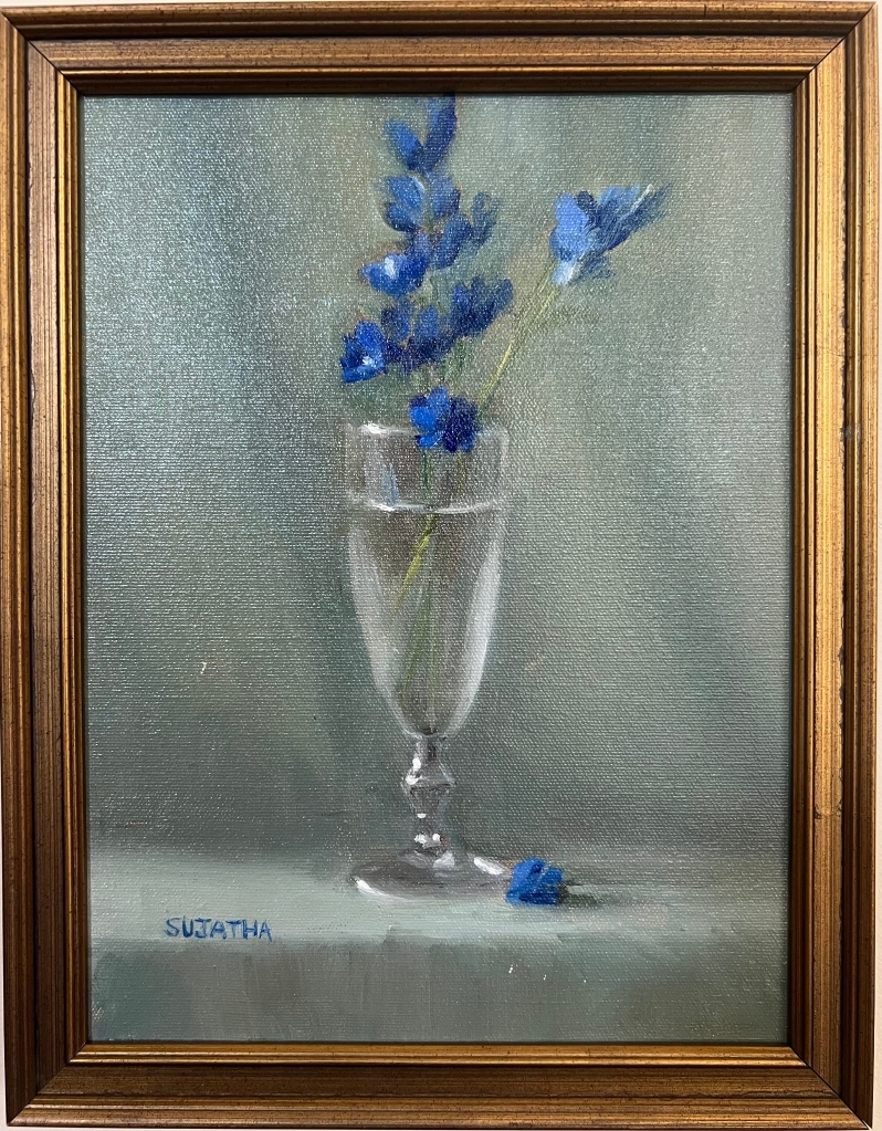 Blue Flowers in a Vase by Sujatha Mohan