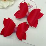 Red Piggy Tail Bows by Madiha Naz